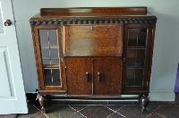 Oak Bookcase  with 2 Glass Doors and Pull-down Desk Top 1120 high, 1200 wide and 310 deep 