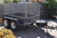 8 x 5 Caged Tandem Trailer with Landcruiser Rim Reg Until  