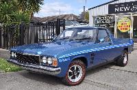 1977 Holden HX Sandman Ute with Model Option 8WM80 XX7 Restored in Deauville Blue Metallic, 5.0L V8 308, M21 Four Speed Manual, 3.36 Ratio Salisbury Diff, Power Steering, Power Brakes with Disc Front, GTS Dash, Bucket Seats, 14inch GTS Style Wheels with Red Strip Tyres - Holden Vehicle Production Report  